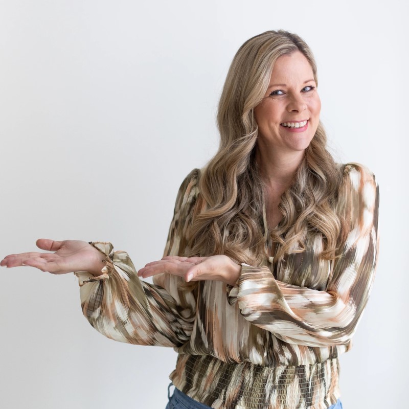 Image of Julie (Journeys by Julie) gesturing towards the left.